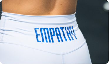 Estampado personalizado de alta visibilidad Detalle de estampado neón en prenda negra personalizada